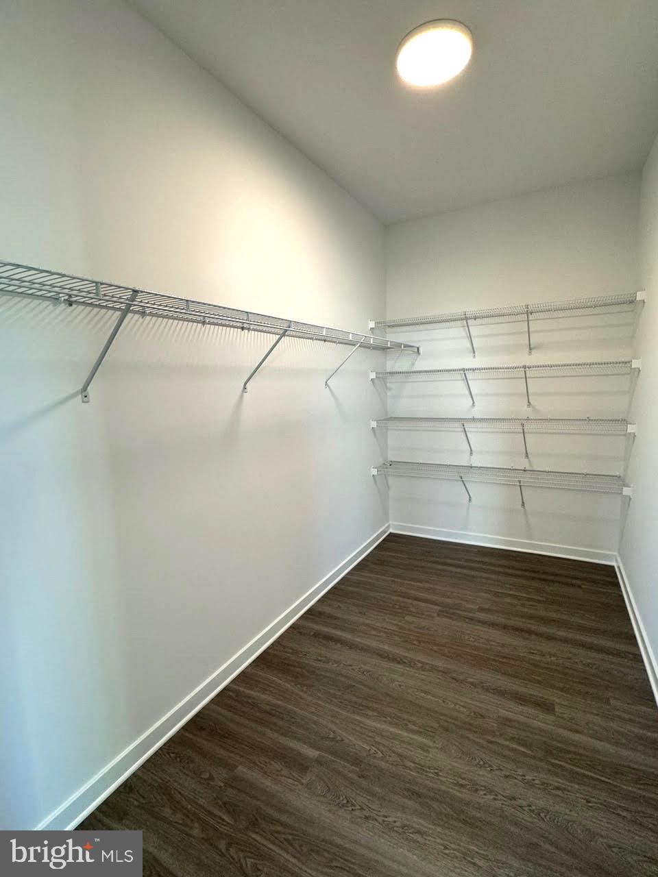 13 Glenaire Road Bunker Hill, WV 25413 - Photo 18 of 23 a view of a room with empty racks