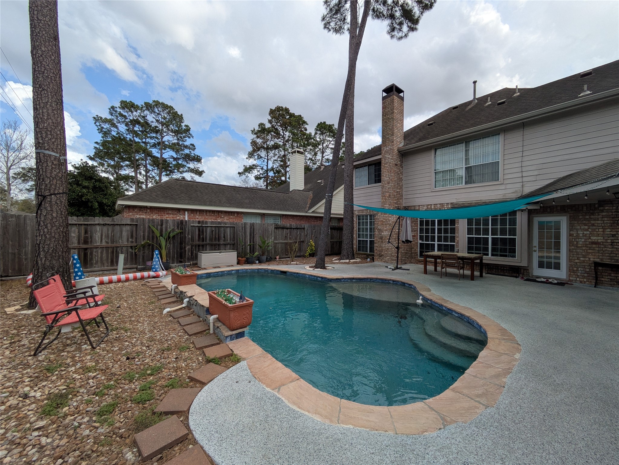 9222 Symphonic Lane Houston, TX 77040 - Photo 23 of 33 Backyard with recently resurfaced pool and deck