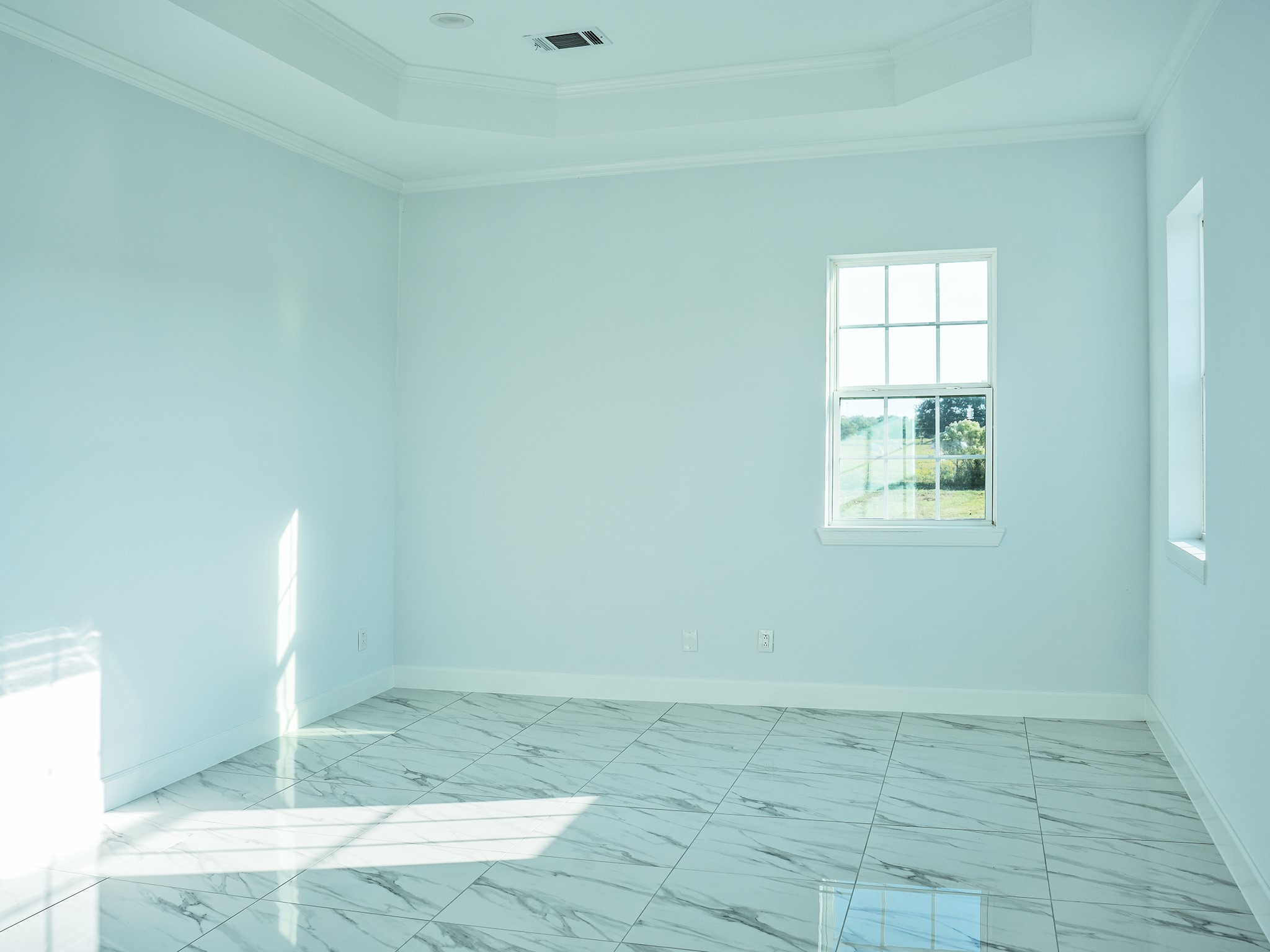 9435A Oberrender Road Needville, TX 77461 - Photo 20 of 36 an empty room with windows