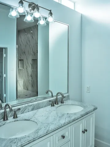 a view of a balcony with floor to ceiling window and wooden floor