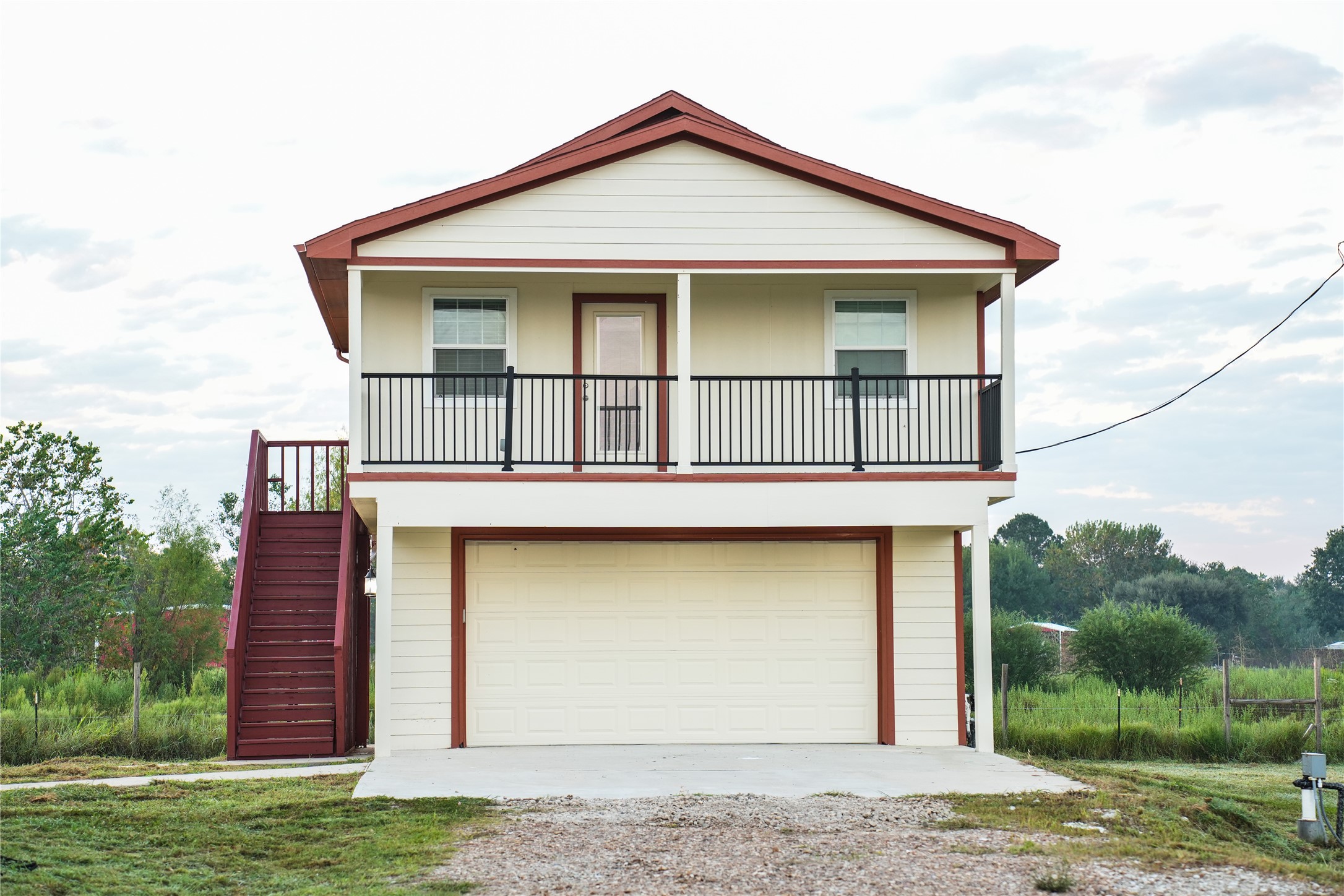 9435A Oberrender Road Needville, TX 77461 - Photo 29 of 36 a front view of a house with garden