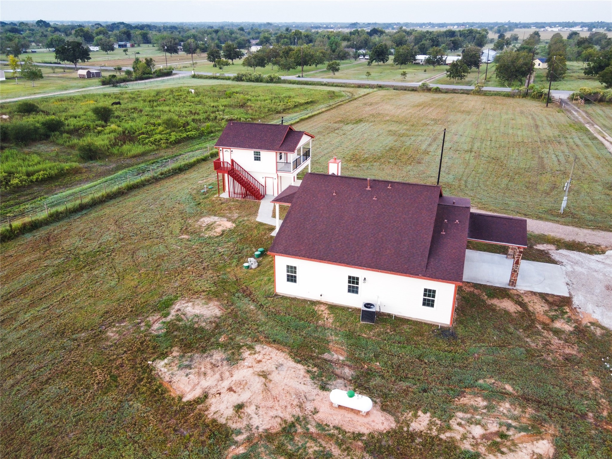 9435A Oberrender Road Needville, TX 77461 - Photo 36 of 36 a view of a lake with a yard and a car parked