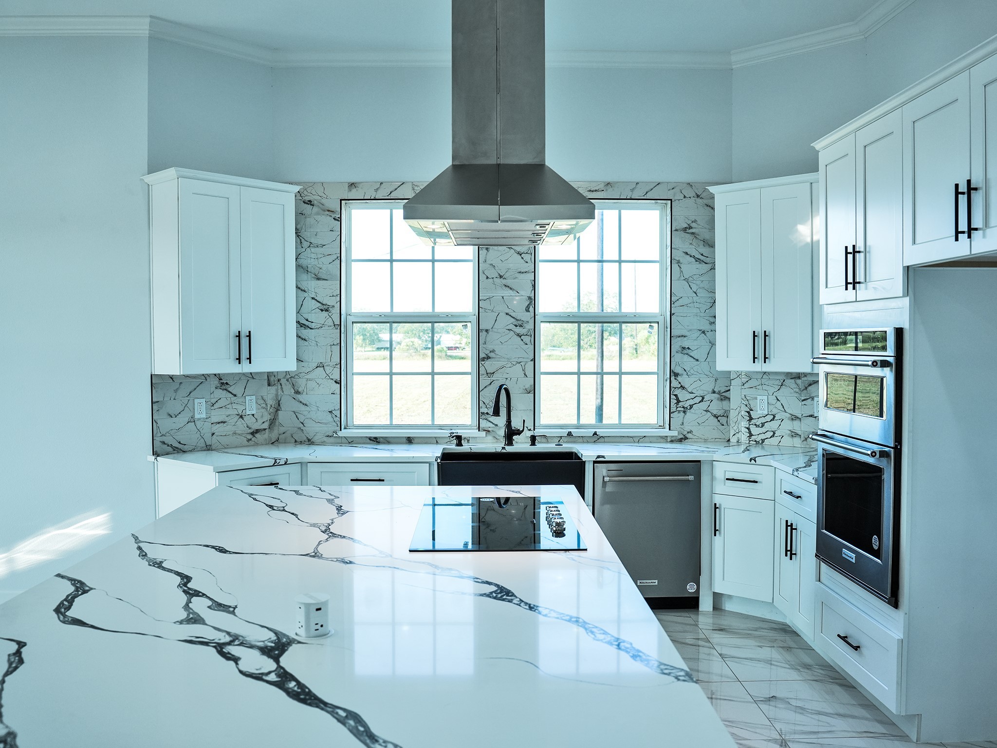 9435A Oberrender Road Needville, TX 77461 - Photo 8 of 36 a kitchen with a stove a sink and a refrigerator