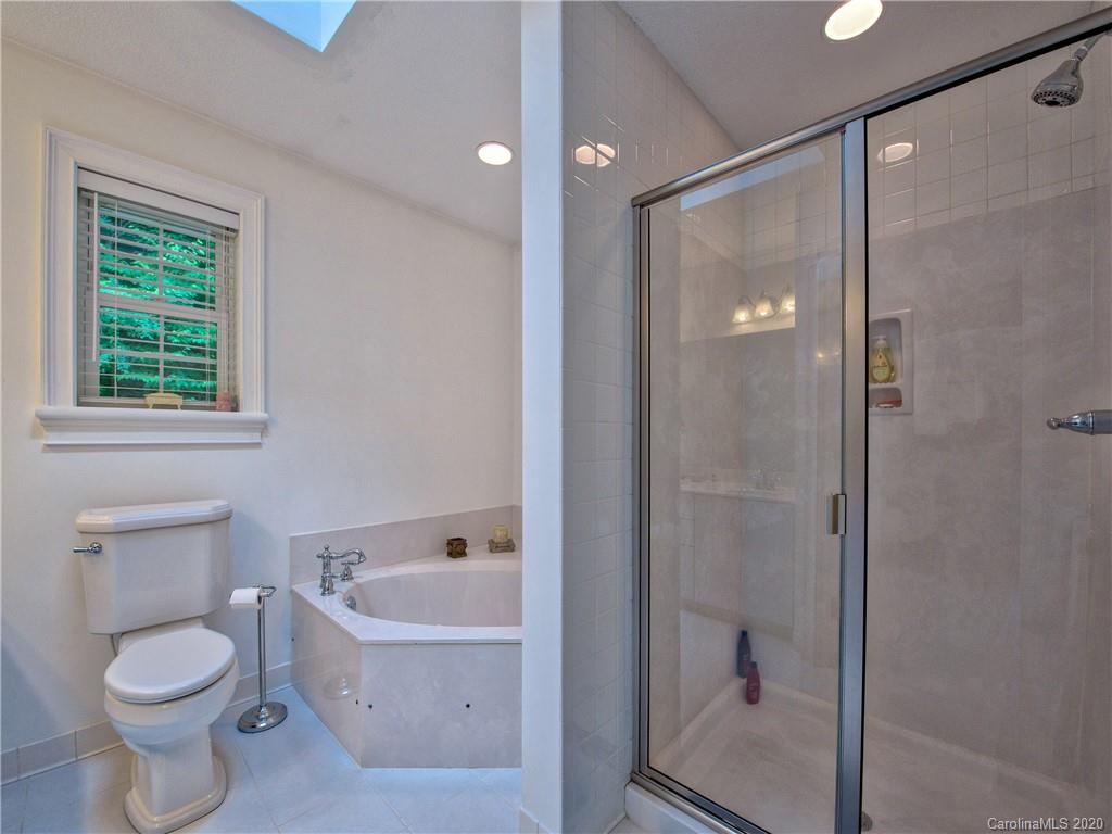 624 Bent Tree Road Maggie Valley, NC 28751 - Photo 23 of 48 a bathroom with a toilet and a shower