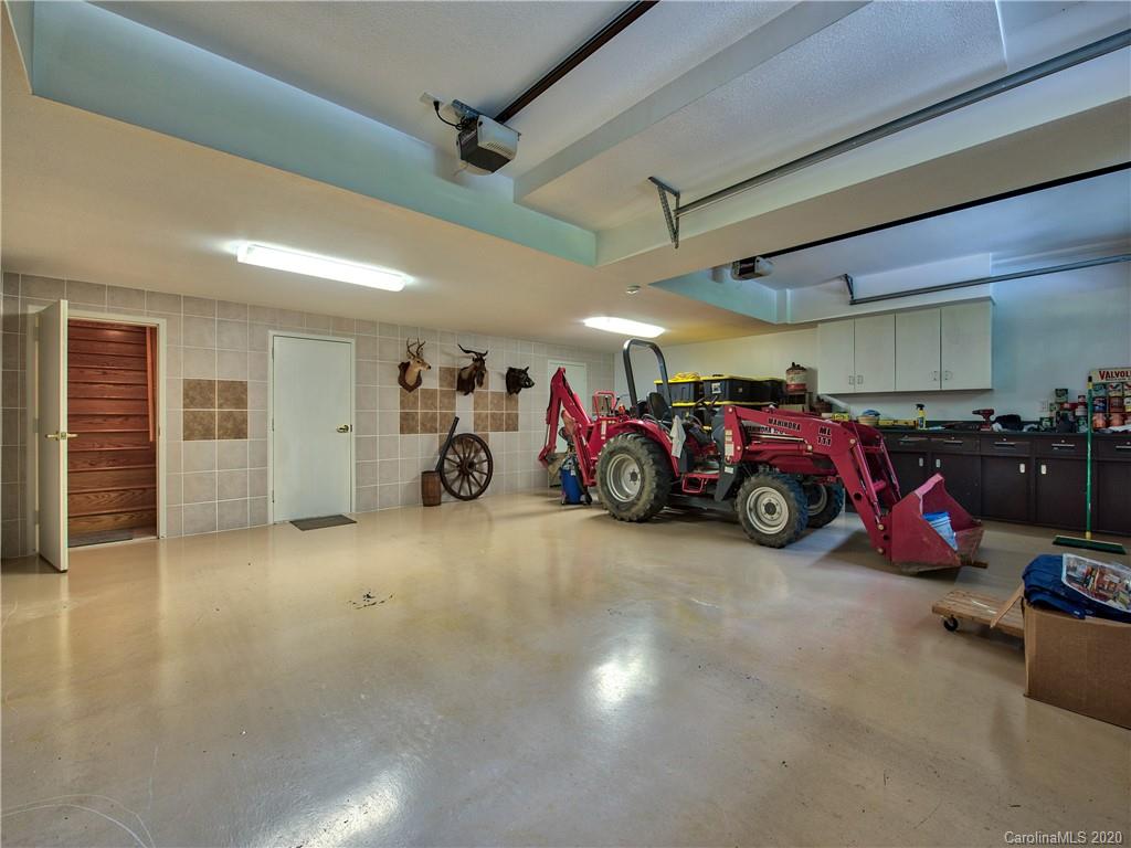 624 Bent Tree Road Maggie Valley, NC 28751 - Photo 29 of 48 a view of a garage with parked cars