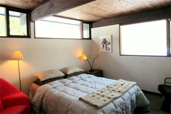 4 Old Farm Road Lincoln, MA 01773 - Photo 13 of 21 a bedroom with a bed and a lamp next to a window