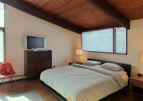 4 Old Farm Road Lincoln, MA 01773 - Photo 8 of 21 a bedroom with a bed and a television