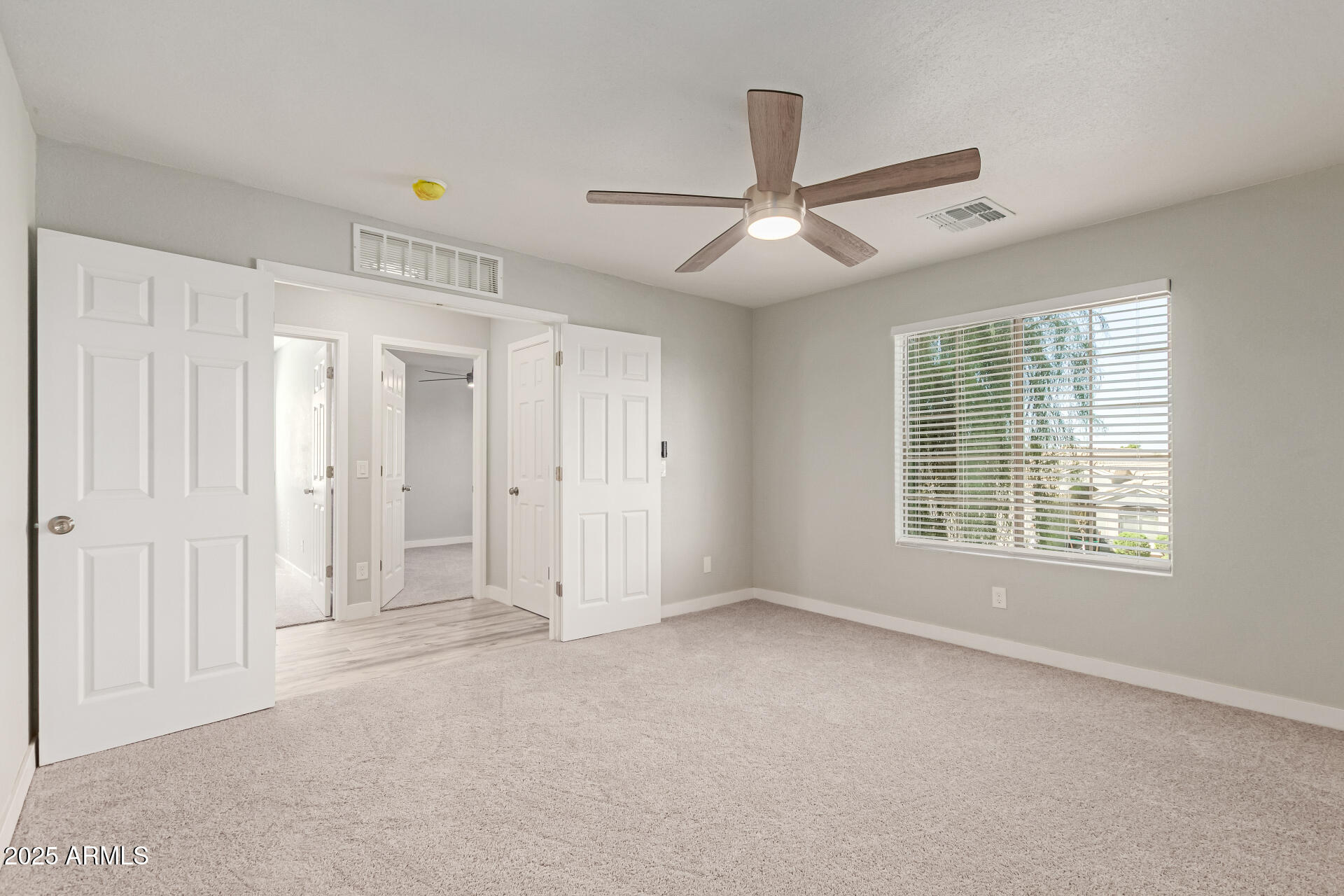 8315 West Crown King Road Tolleson, AZ 85353 - Photo 12 of 31 a view of an empty room with a window
