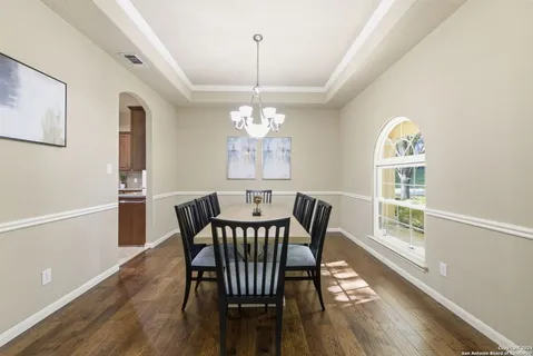a large kitchen with kitchen island a sink counter space appliances and a center island