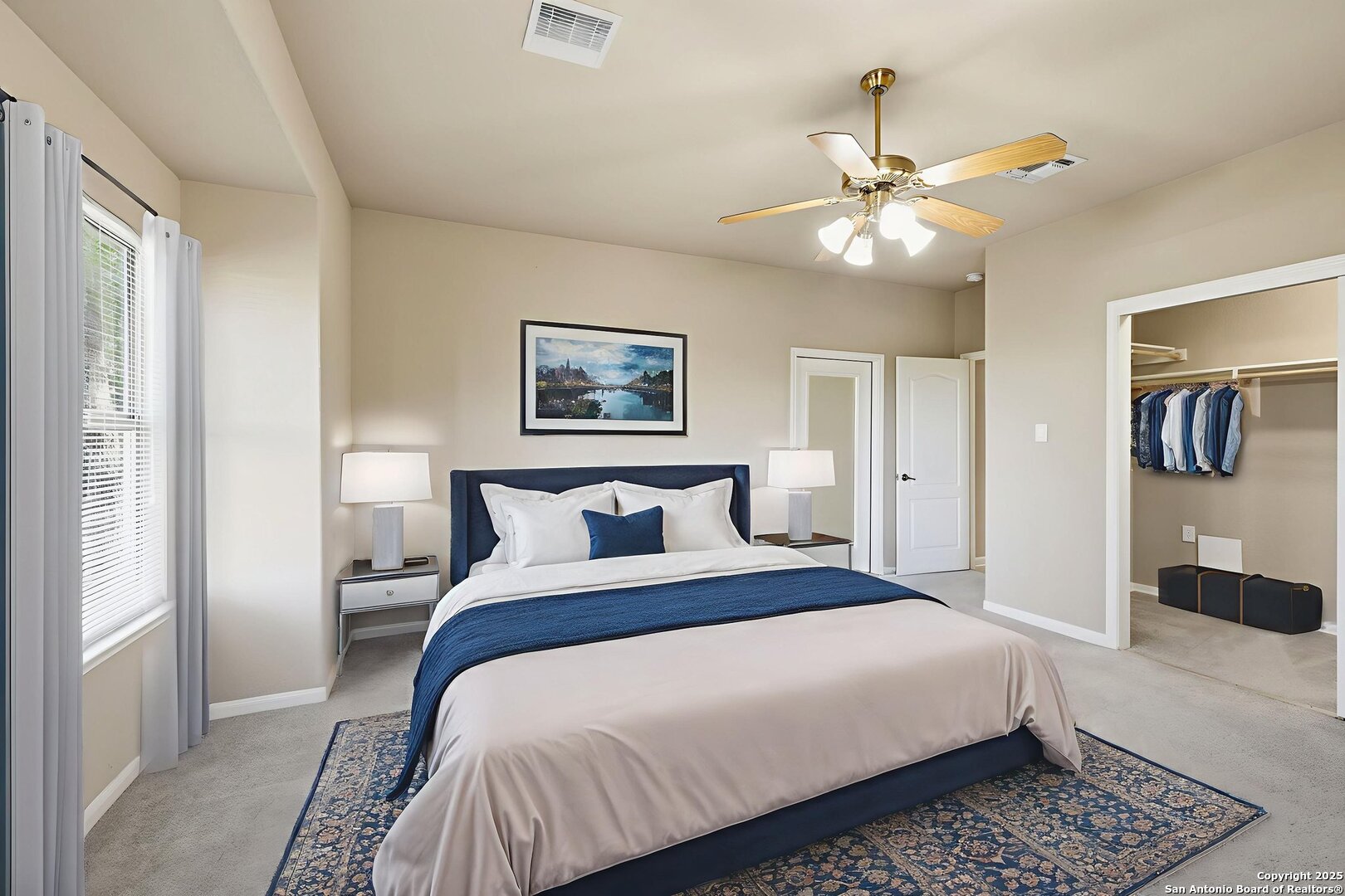 2291 Frontier Spring Branch, TX 78070 - Photo 33 of 58 a bedroom with a large bed and a chandelier