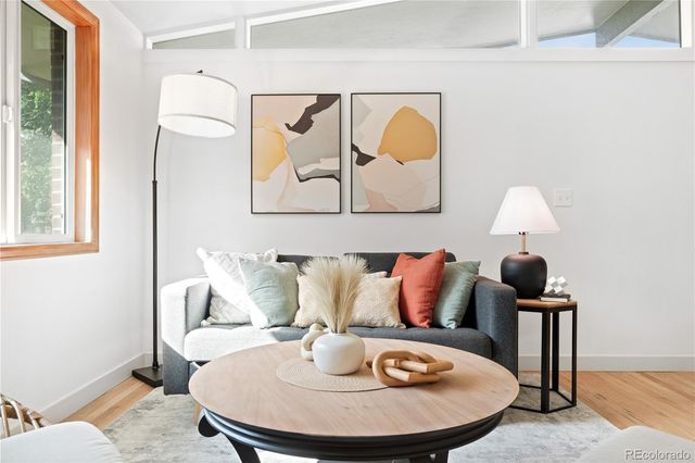 a kitchen with a sink and a refrigerator