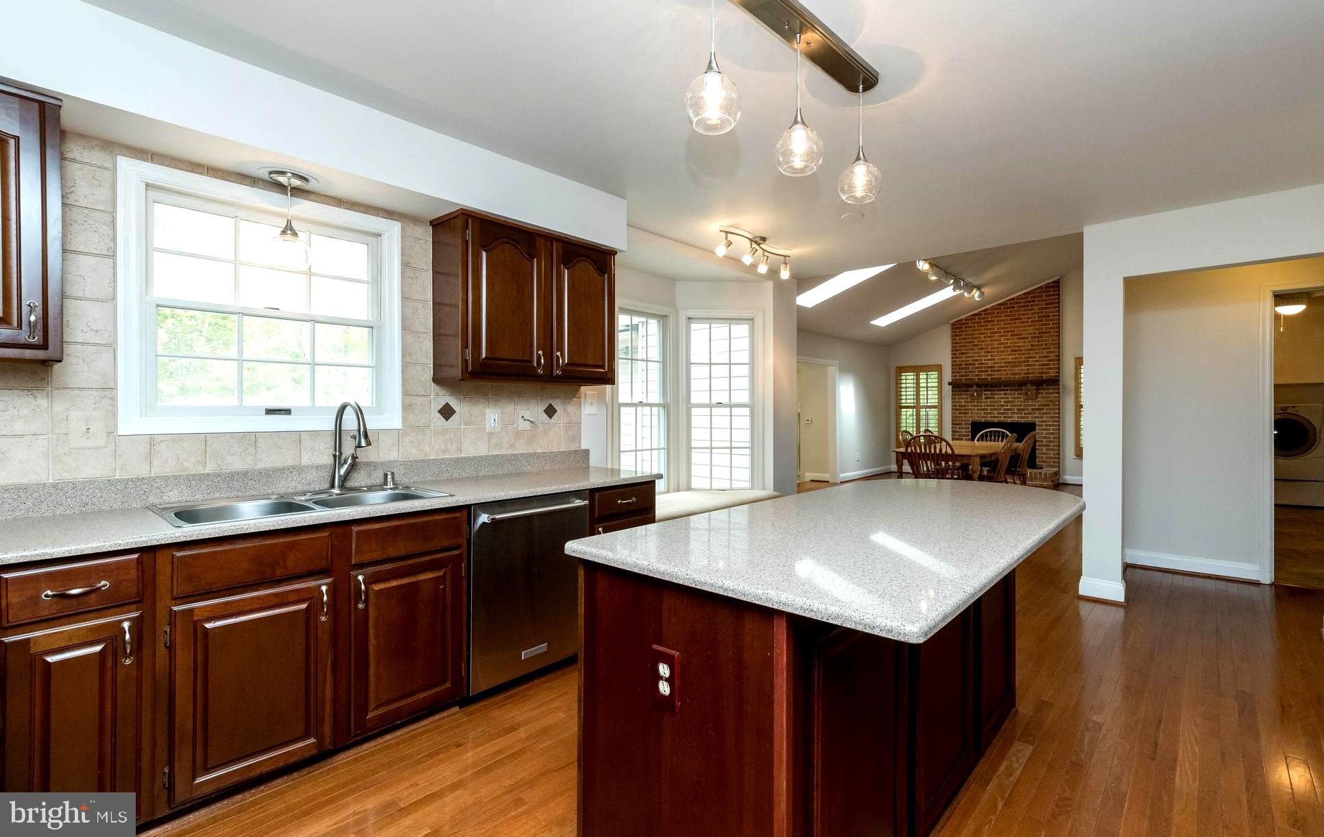 3103 Arrowhead Farms Road Gambrills, MD 21054 - Photo 15 of 55 Urban Bistro Kitchen with Island Dining Bar