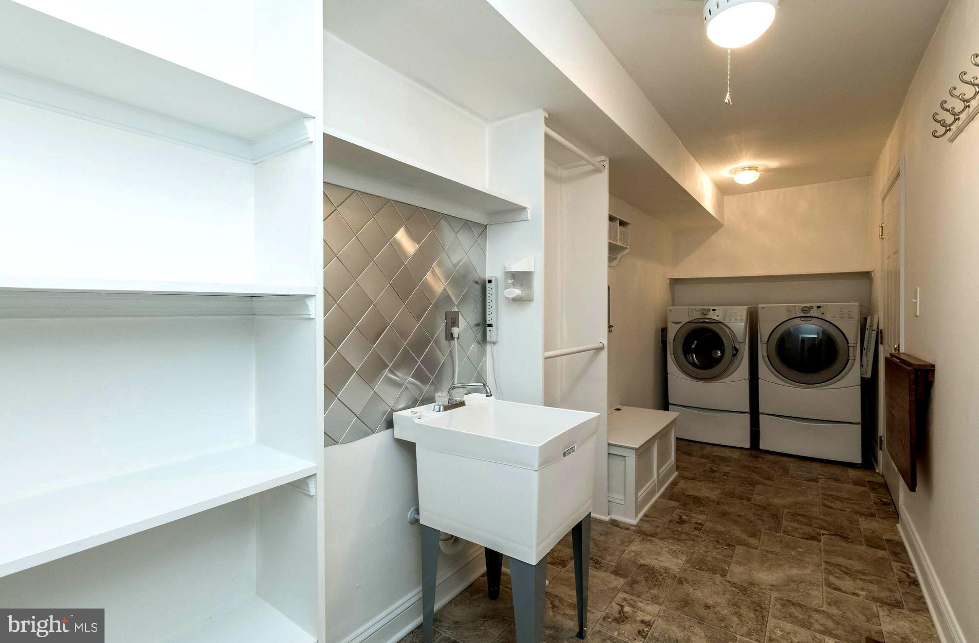 3103 Arrowhead Farms Road Gambrills, MD 21054 - Photo 29 of 55 Laundry/Mudroom with Utility Sink & Storage