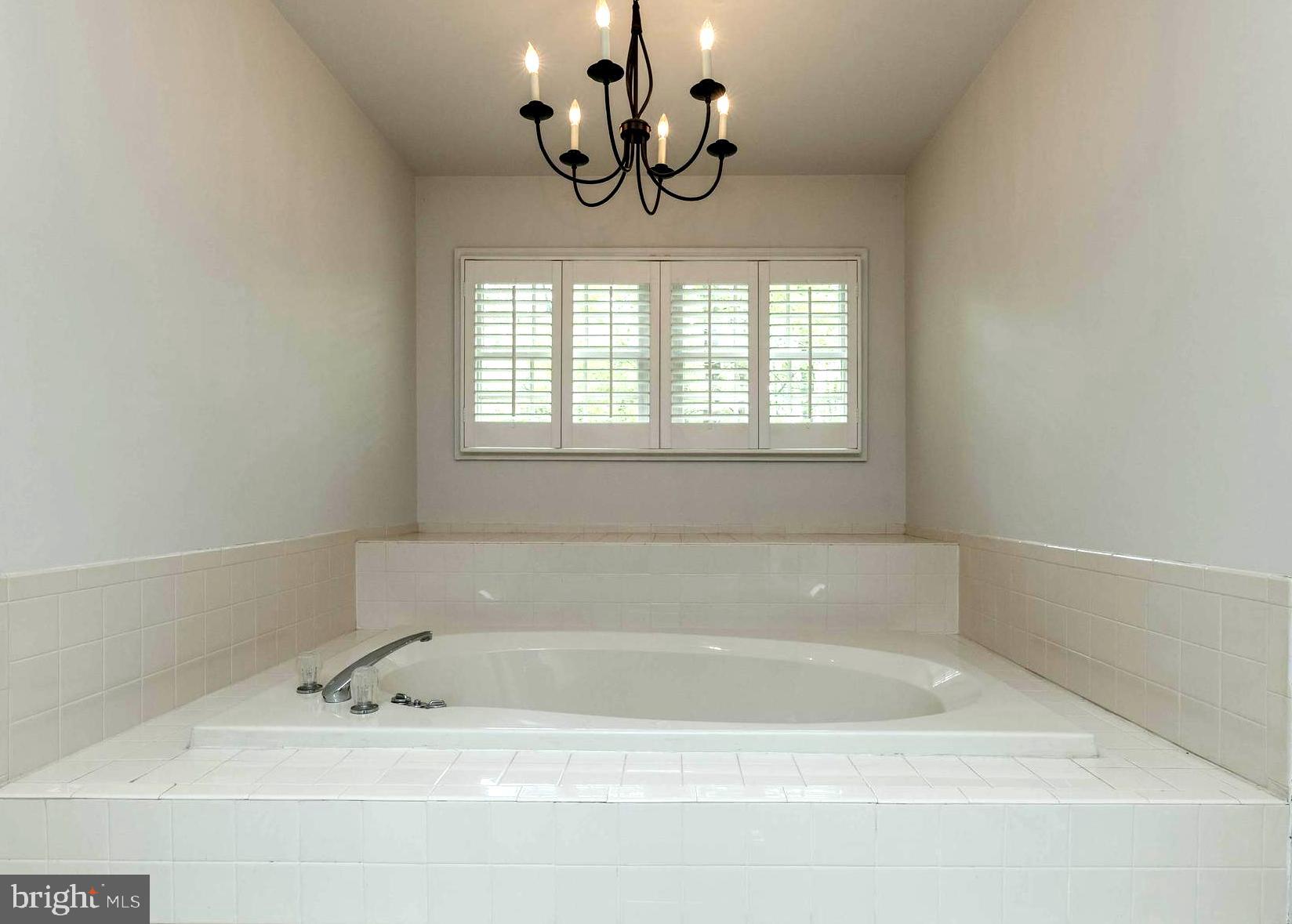 3103 Arrowhead Farms Road Gambrills, MD 21054 - Photo 34 of 55 Escape to Your Romantic Chandeliered Soaking Tub