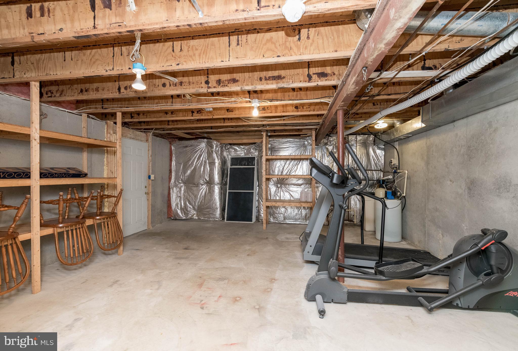 3103 Arrowhead Farms Road Gambrills, MD 21054 - Photo 51 of 55 Unfinished Storage Area . Gym Equipment Conveys!