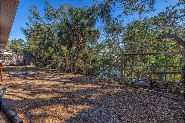 a view of backyard with green space
