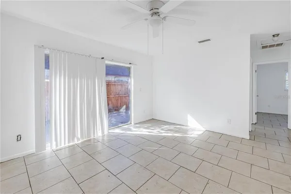 a view of an empty room and window