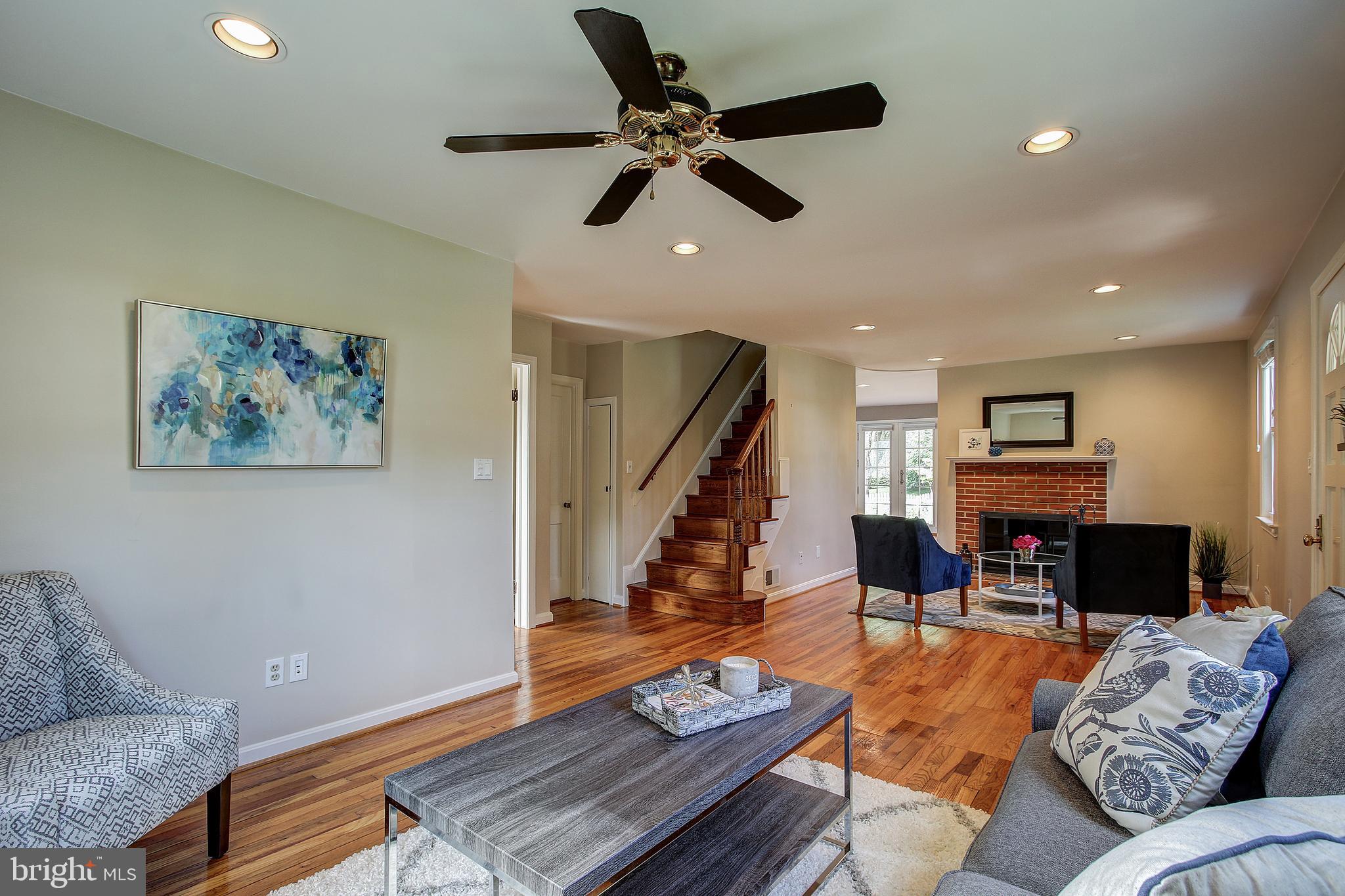 10133 Greenock Road Silver Spring, MD 20901 - Photo 7 of 41 Spacious living area with wood floors throughout