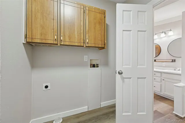 a view of cabinets and utility room