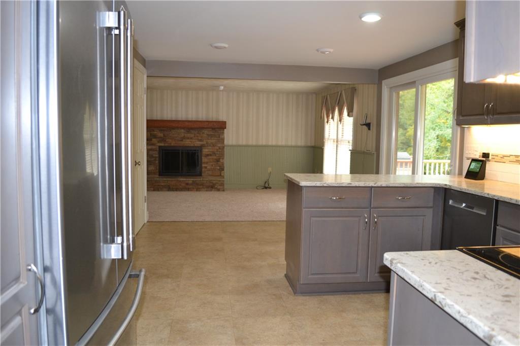 5913 Graybrook Drive Export, PA 15632 - Photo 8 of 24 a kitchen with a sink stove and refrigerator