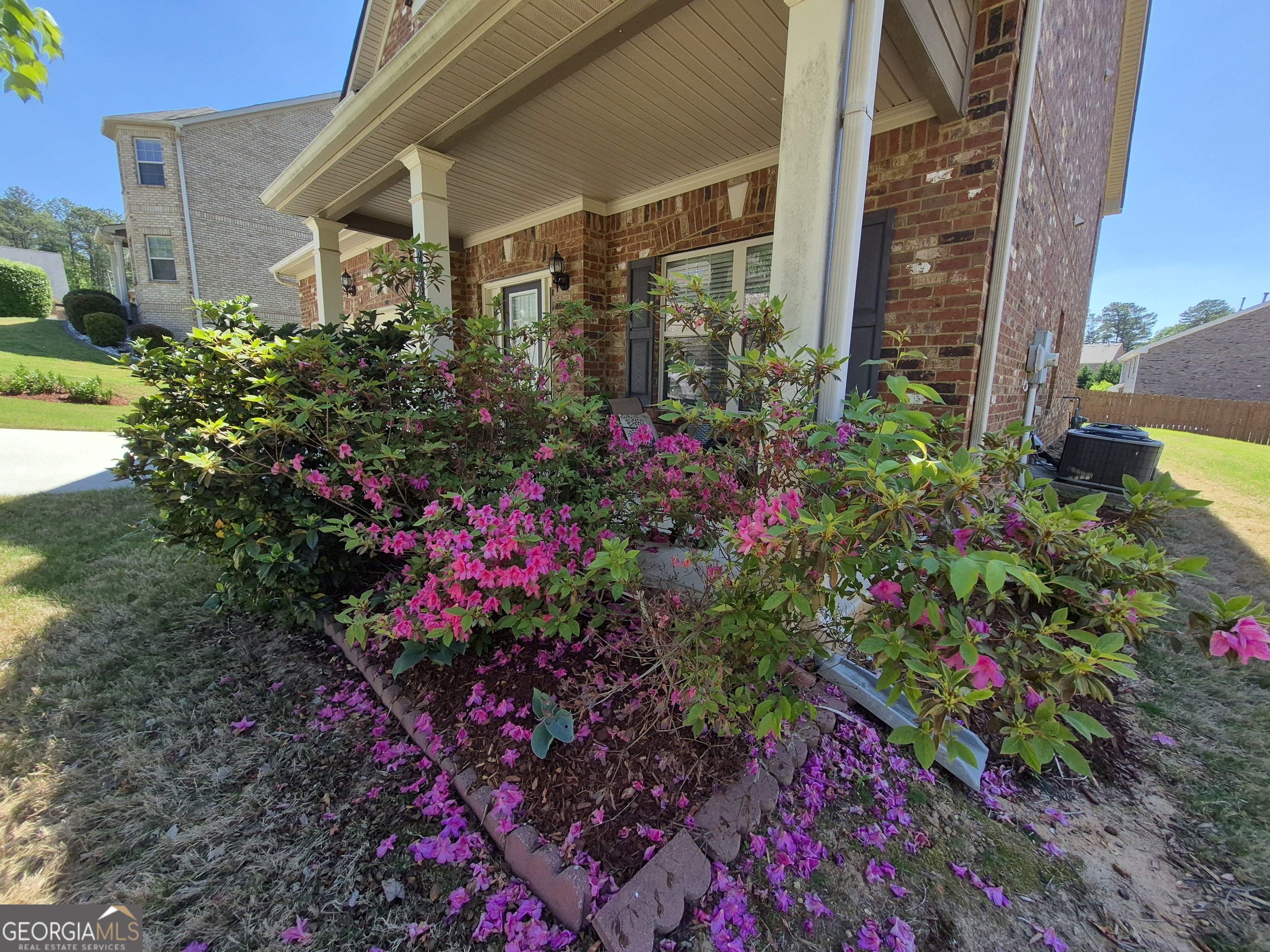 2269 Reddy Farm Lane Grayson, GA 30017 - Photo 2 of 50 Walk up and smell the Flowers