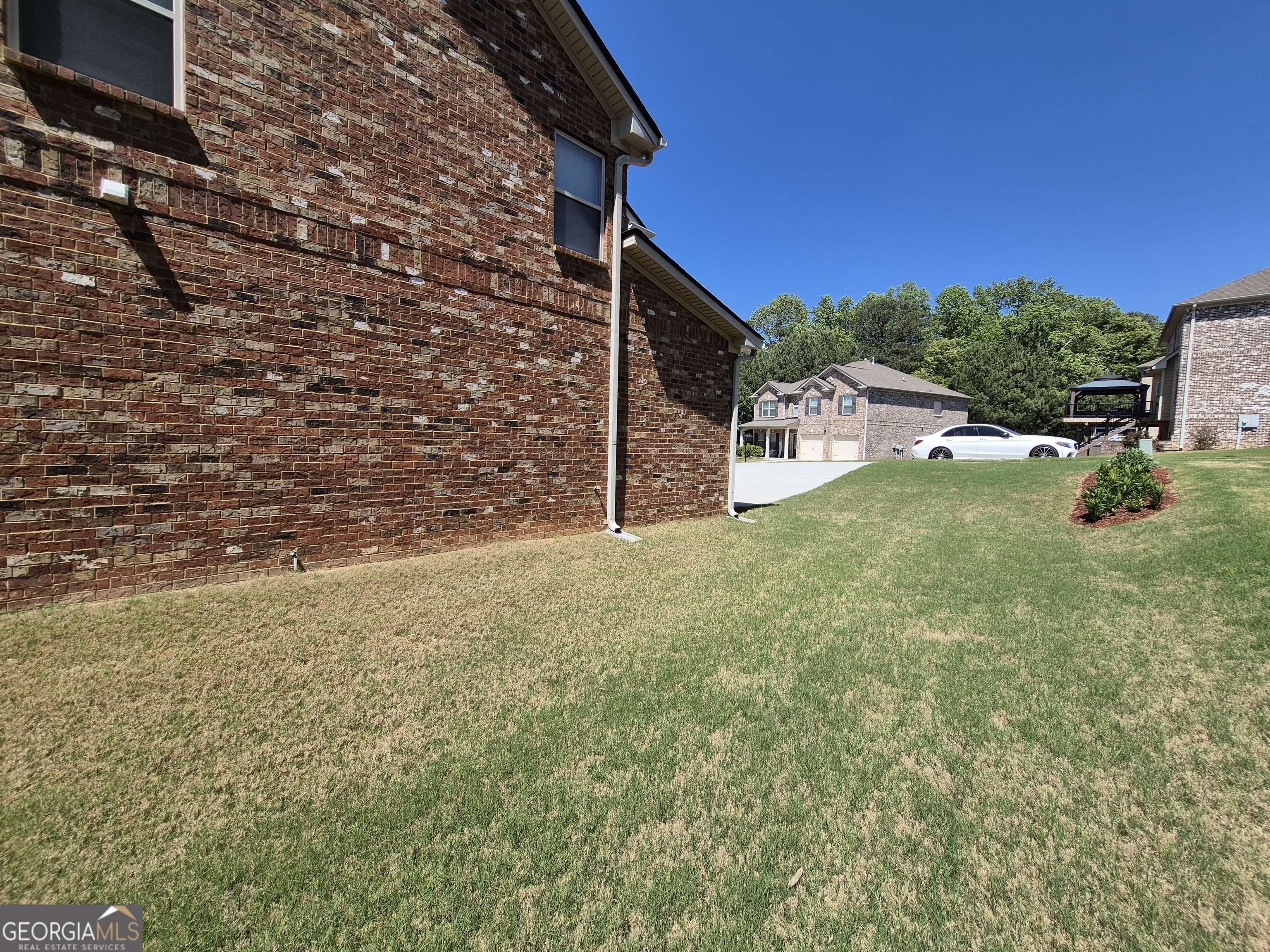 2269 Reddy Farm Lane Grayson, GA 30017 - Photo 5 of 50 Beautiful Landscapes surrounds this home