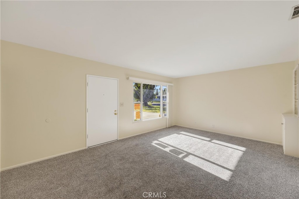 8971 Glencoe Drive Riverside, CA 92503 - Photo 8 of 41 an empty room with windows