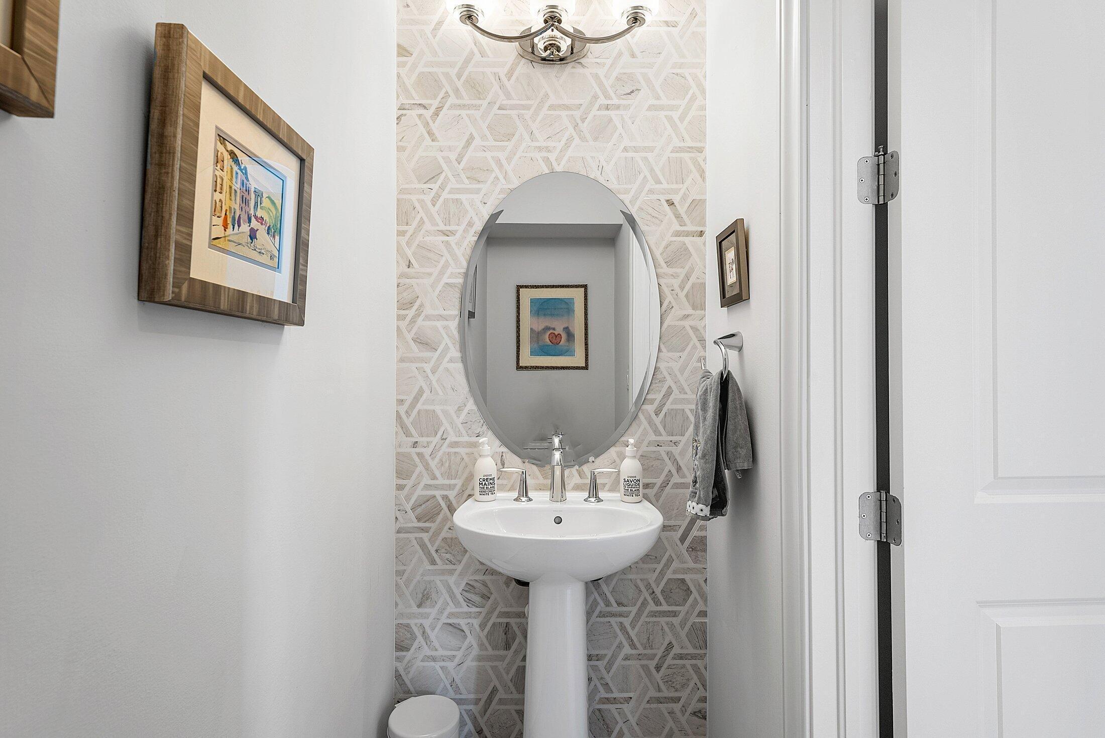 2707 Northwest 75th Street Boca Raton, FL 33496 - Photo 39 of 74 a bathroom with a sink and a mirror