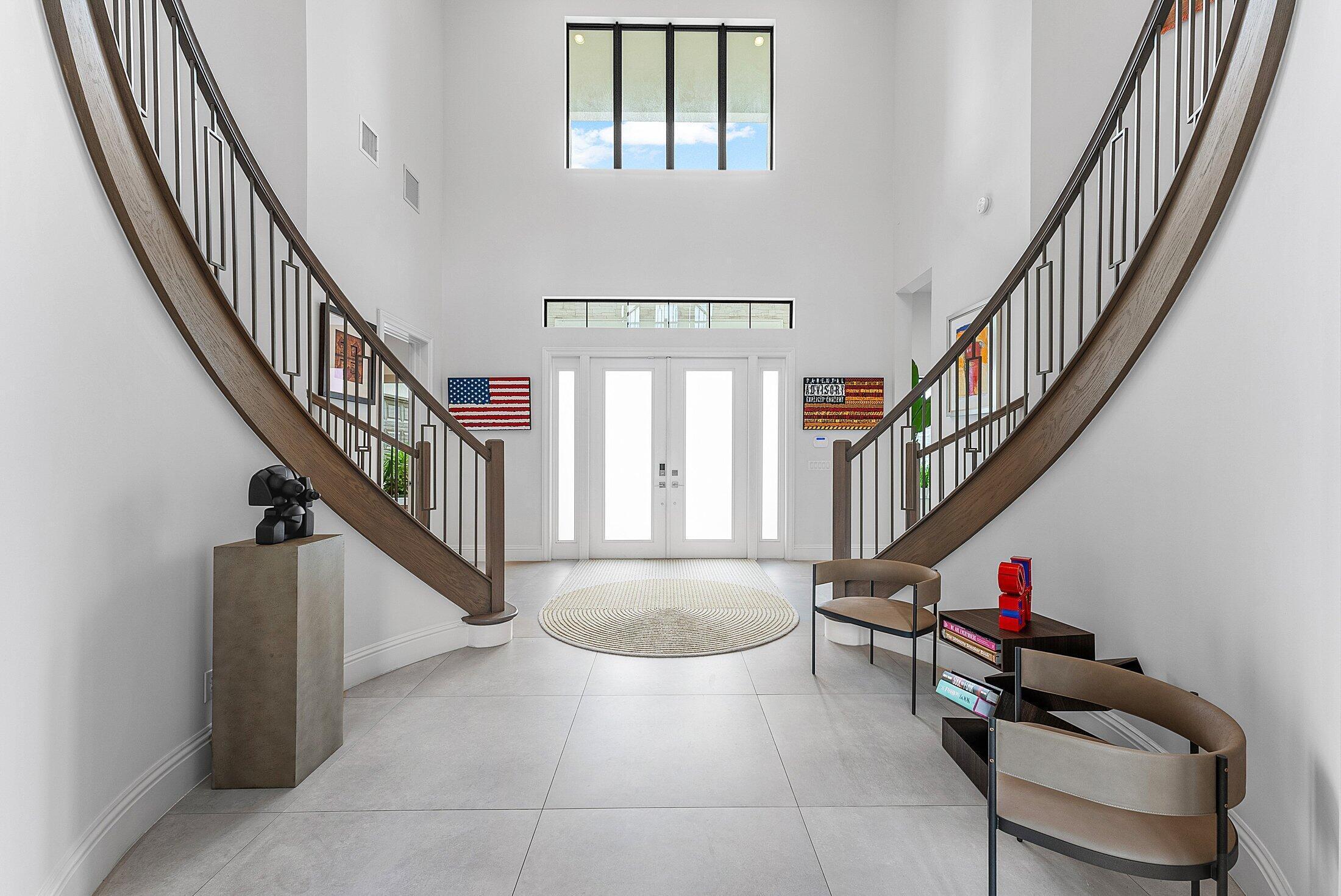 2707 Northwest 75th Street Boca Raton, FL 33496 - Photo 5 of 74 a view of entryway and hall with wooden floor