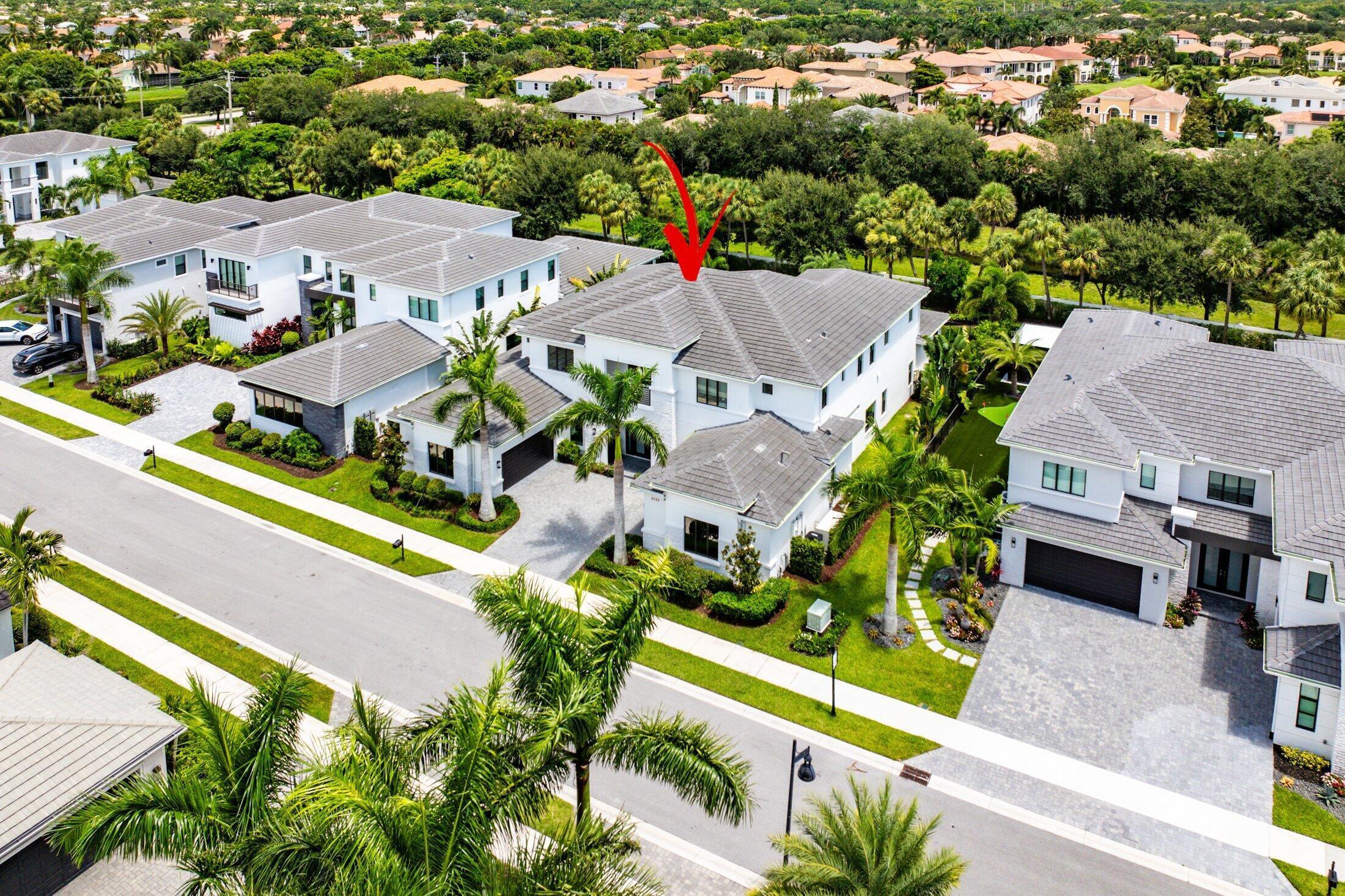 2707 Northwest 75th Street Boca Raton, FL 33496 - Photo 60 of 74 an aerial view of residential houses with outdoor space
