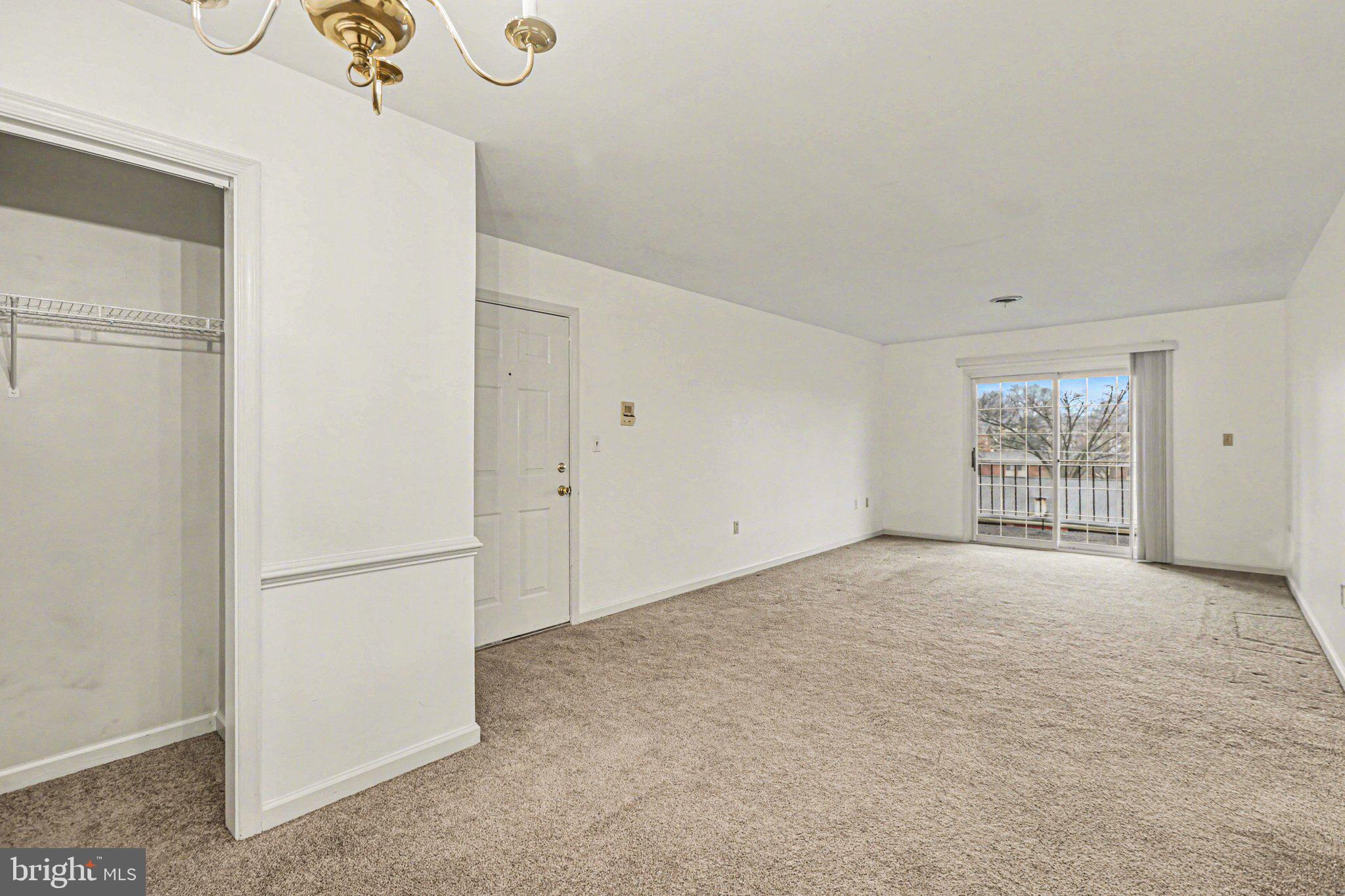 298 Colonial Road, Unit 7 Harrisburg, PA 17109 - Photo 5 of 11 a view of an empty room with a window