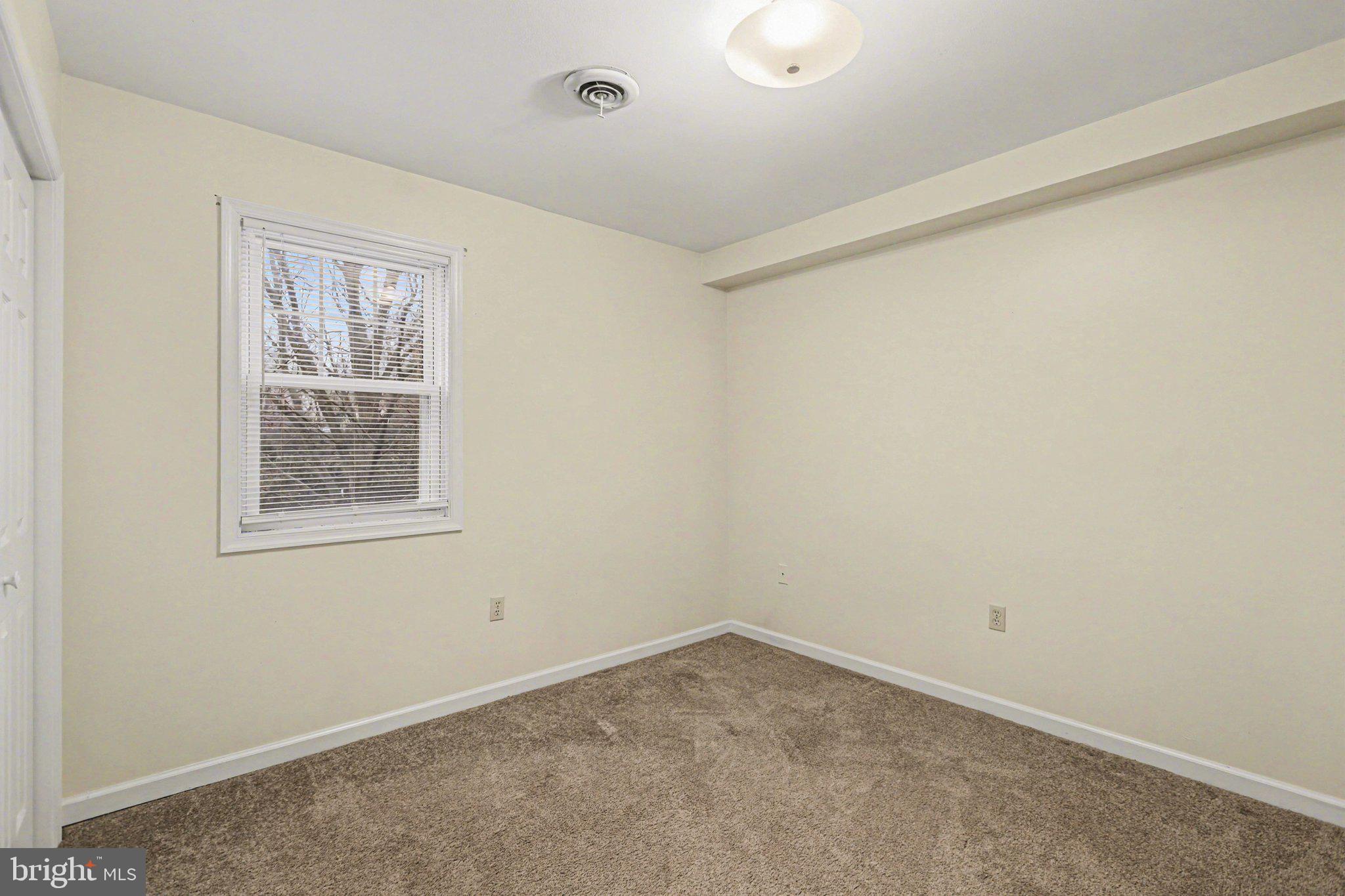 298 Colonial Road, Unit 7 Harrisburg, PA 17109 - Photo 10 of 11 an empty room with a window
