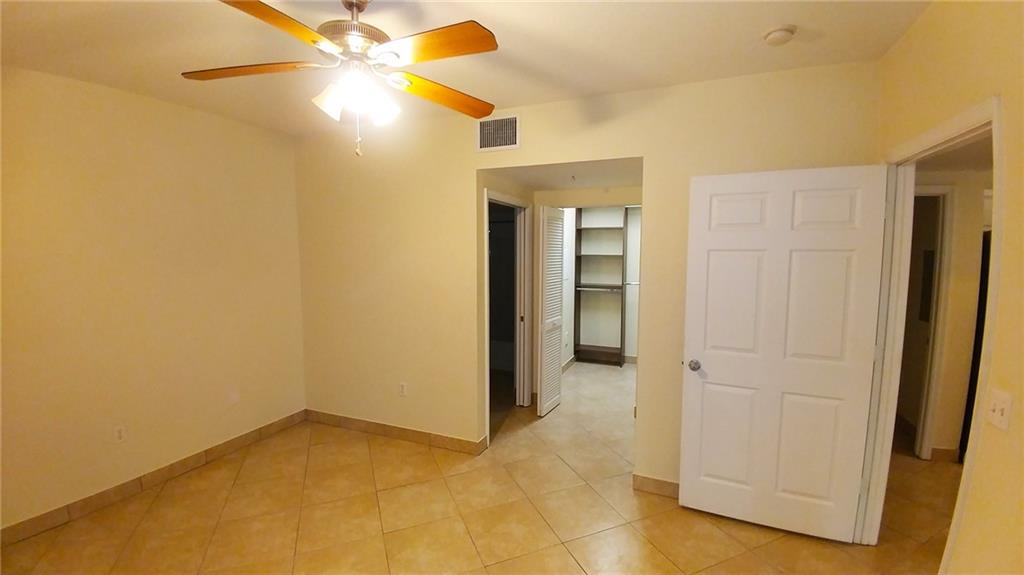 6640 West Sample Road, Unit 6640 Coral Springs, FL 33067 - Photo 12 of 25 a view of an empty room