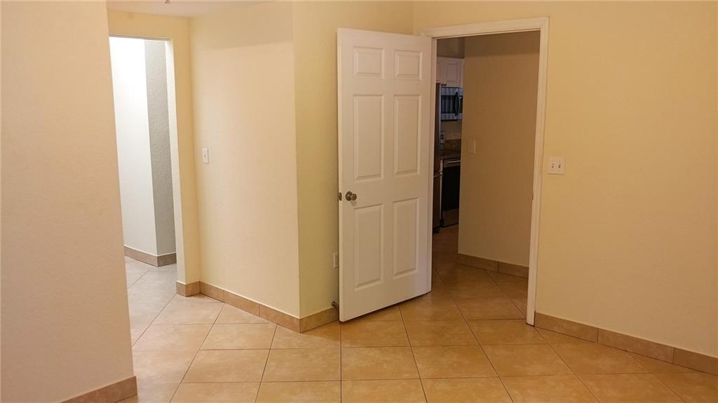 6640 West Sample Road, Unit 6640 Coral Springs, FL 33067 - Photo 15 of 25 a view of an empty room