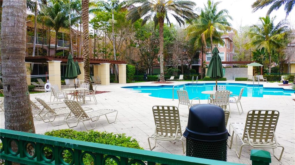 6640 West Sample Road, Unit 6640 Coral Springs, FL 33067 - Photo 25 of 25 a view of outdoor space yard and patio