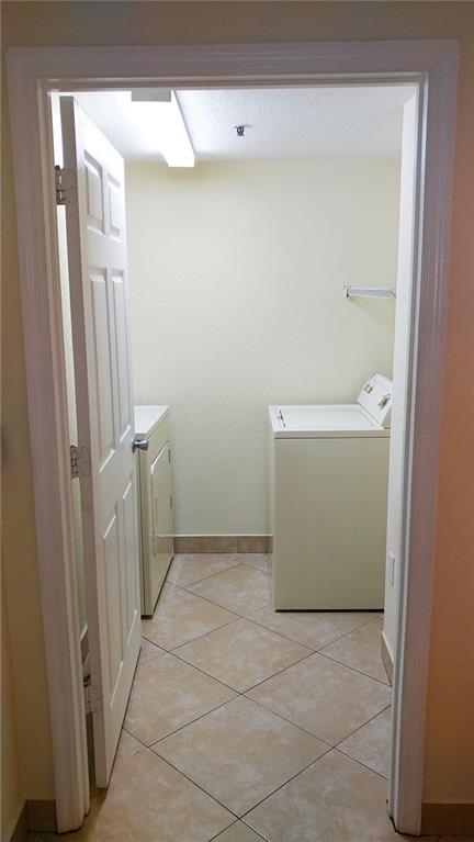 6640 West Sample Road, Unit 6640 Coral Springs, FL 33067 - Photo 10 of 25 a view of cabinets