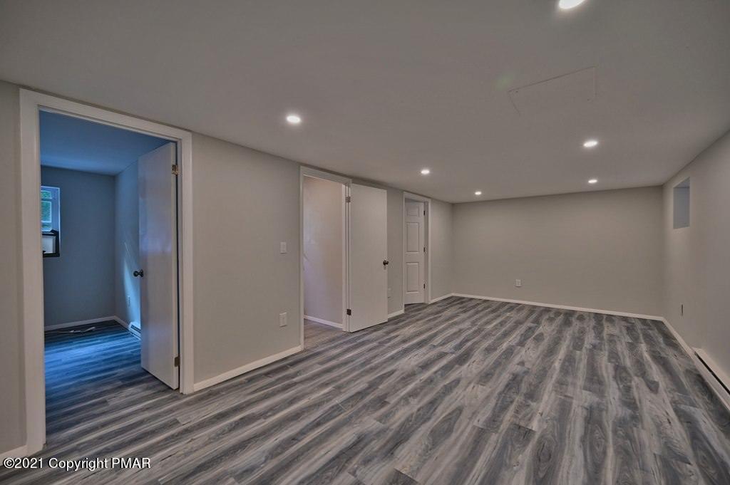 102 Forest Road Dingmans Ferry, PA 18328 - Photo 51 of 75 a view of a room with wooden floor