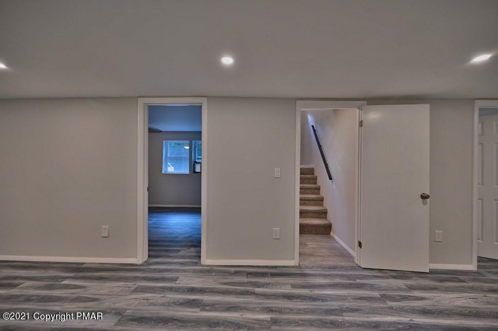 102 Forest Road Dingmans Ferry, PA 18328 - Photo 59 of 75 a view of a livingroom with stairs and stairs