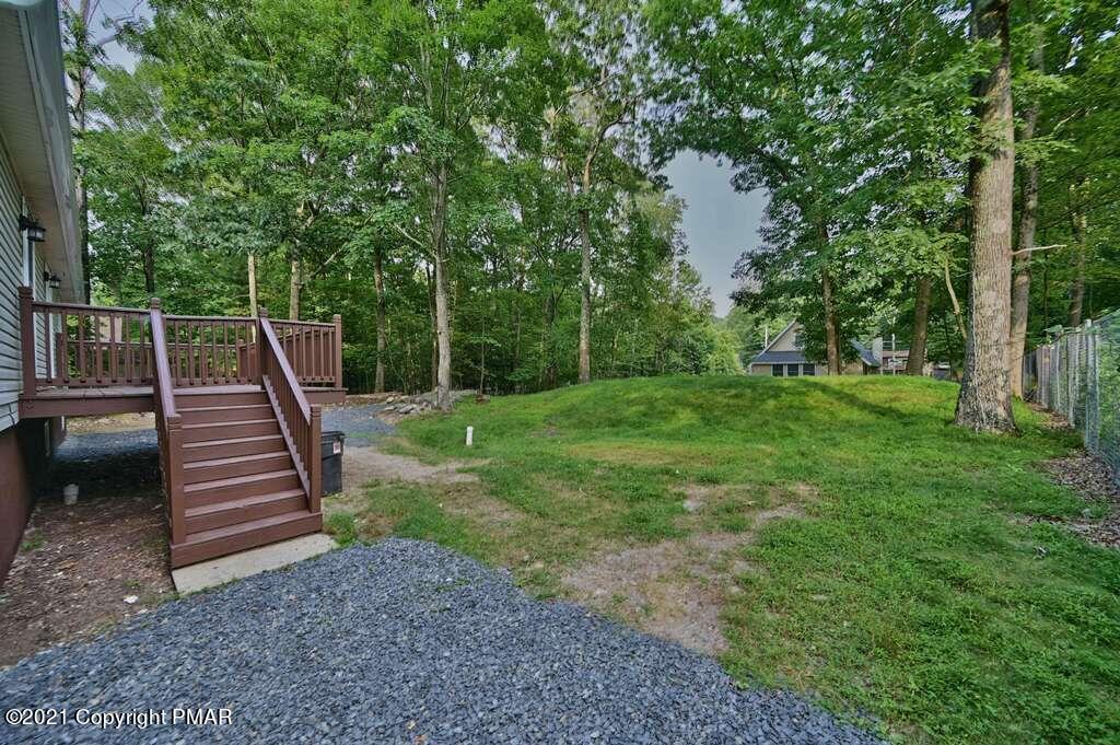 102 Forest Road Dingmans Ferry, PA 18328 - Photo 71 of 75 a view of a backyard with green space