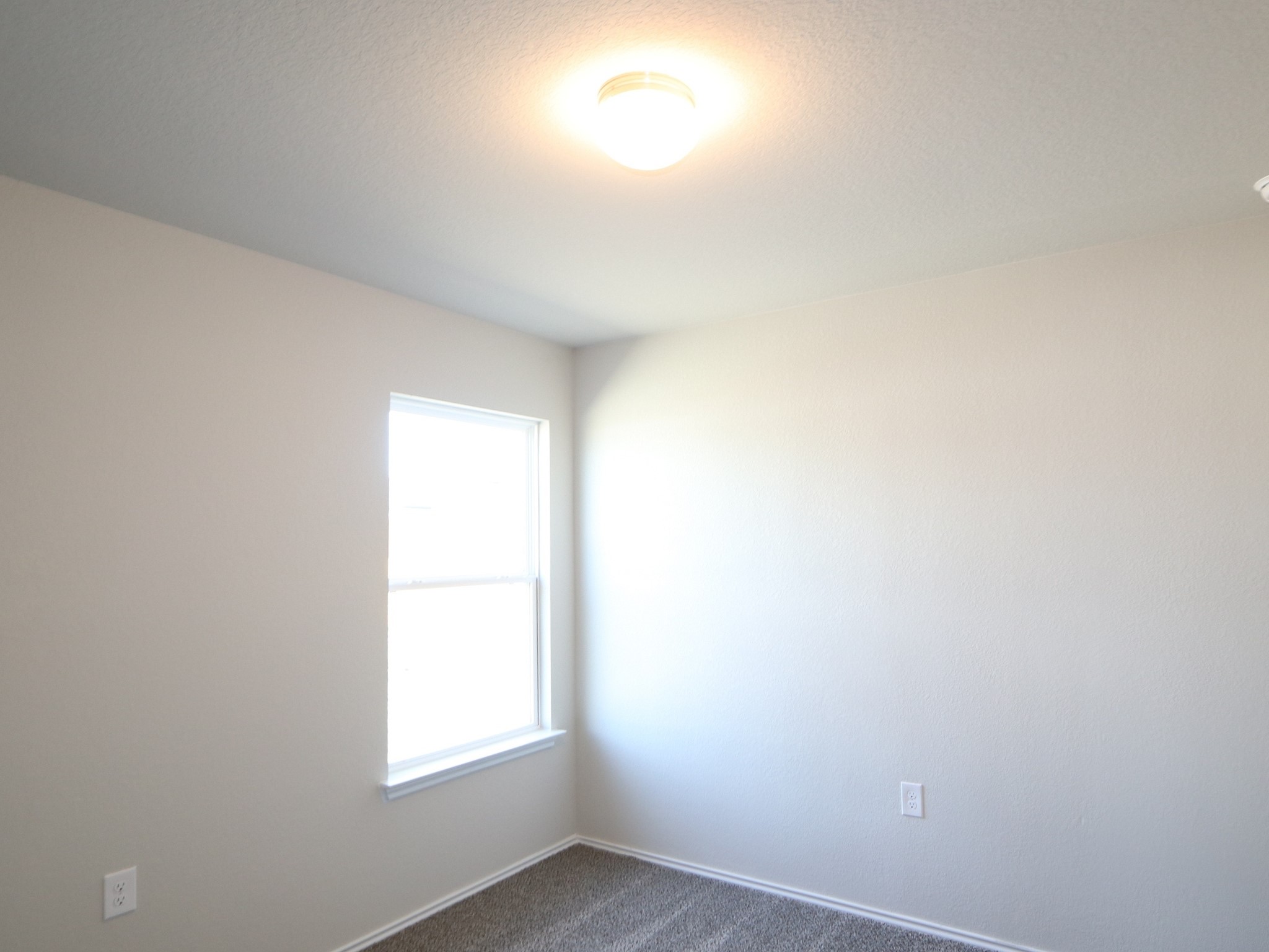 9217 Furman Drive Austin, TX 78747 - Photo 14 of 16 an empty room with a window