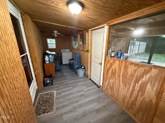 a view of a hallway with a large window