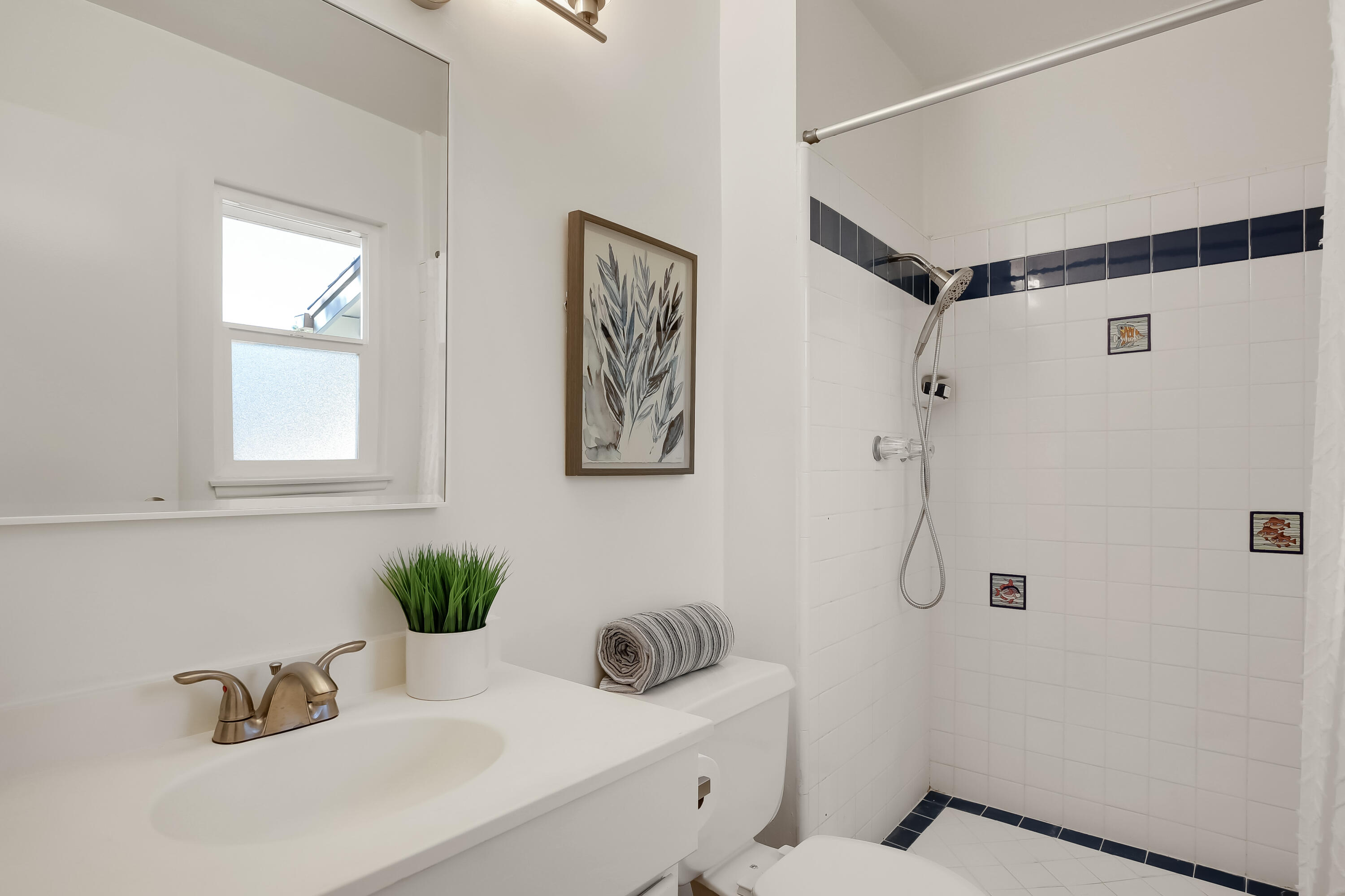 249 Placer Drive Santa Barbara, CA 93117 - Photo 15 of 33 a bathroom with a sink toilet and shower