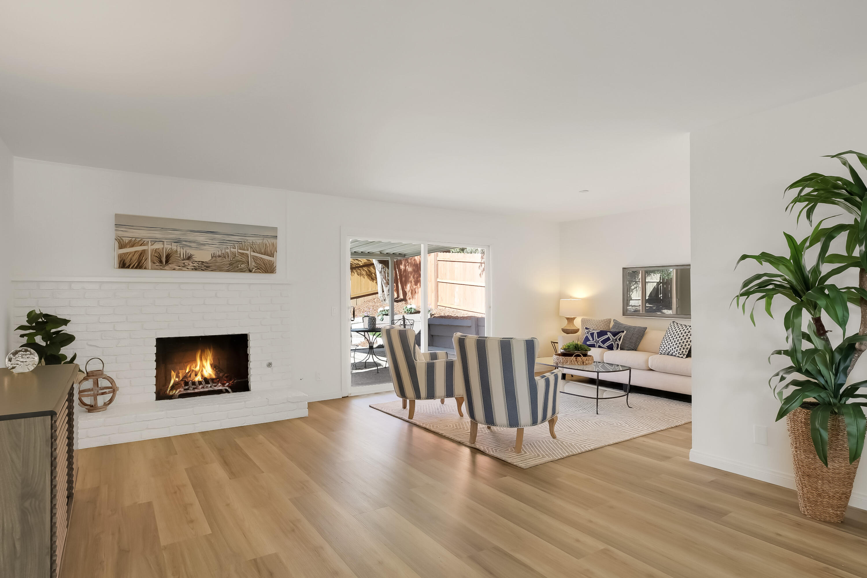 249 Placer Drive Santa Barbara, CA 93117 - Photo 2 of 33 a living room with furniture and a fireplace
