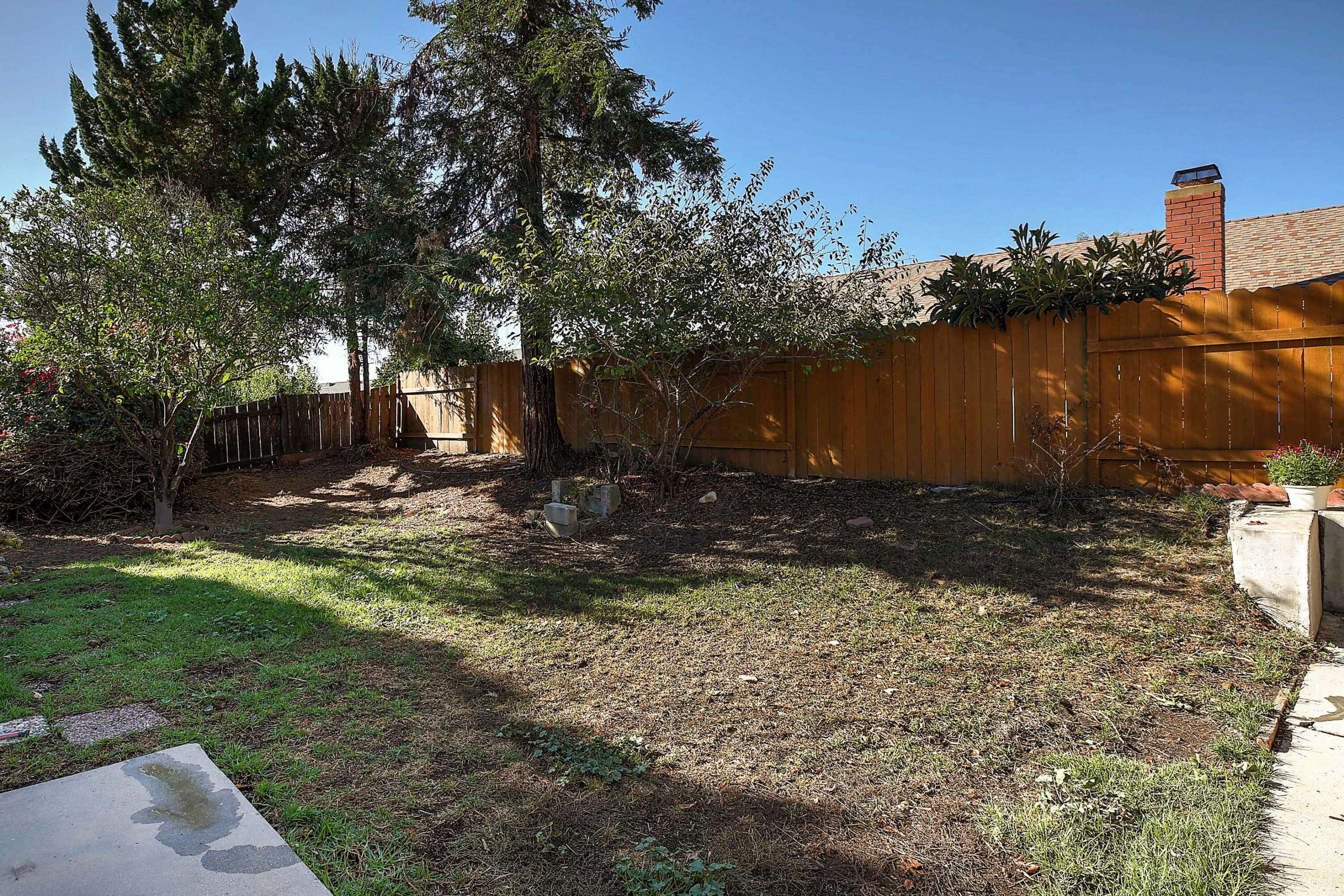 249 Placer Drive Santa Barbara, CA 93117 - Photo 22 of 33 a view of a fire pit with large trees