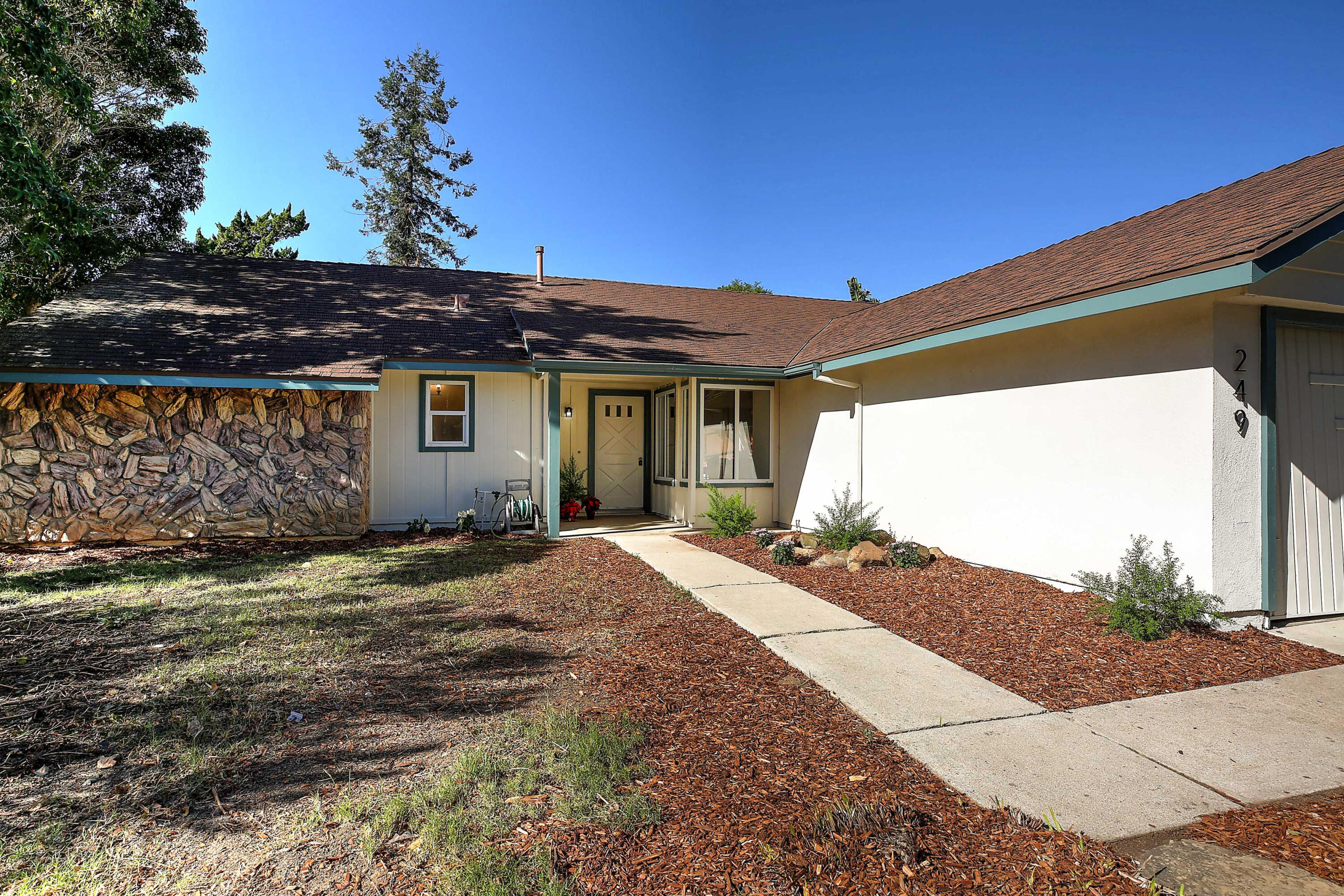 249 Placer Drive Santa Barbara, CA 93117 - Photo 29 of 33 a front view of a house with a yard