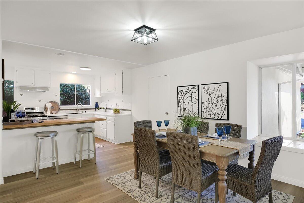 249 Placer Drive Santa Barbara, CA 93117 - Photo 7 of 33 a view of a dining room with furniture window and wooden floor