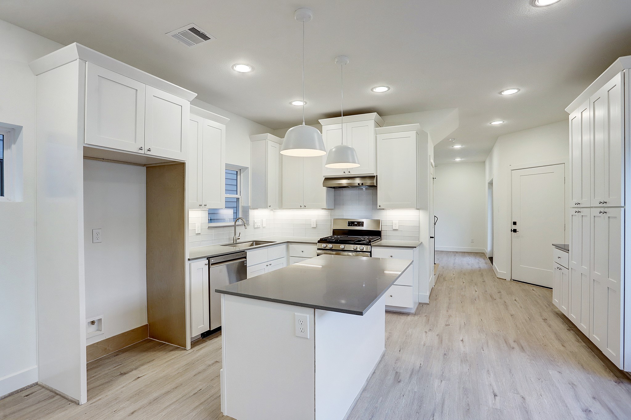 7407 Rusk Street, Unit A Houston, TX 77011 - Photo 6 of 24 Spacious kitchen with ample amount of cabinetry.