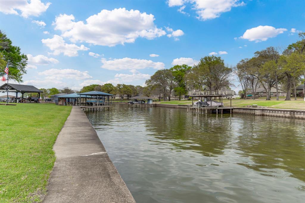 A2000 Azure Lane Streetman, TX 75859 - Photo 9 of 12 a view of a lake with houses