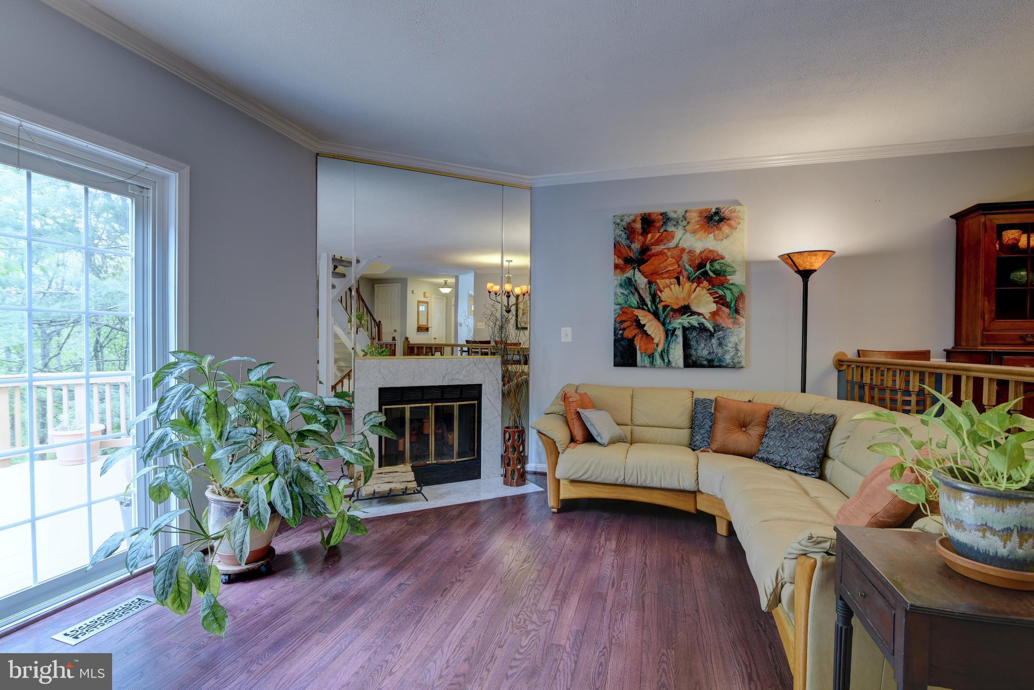 11926 Sentinel Point Court Reston, VA 20191 - Photo 9 of 26 Living room w/access to deck