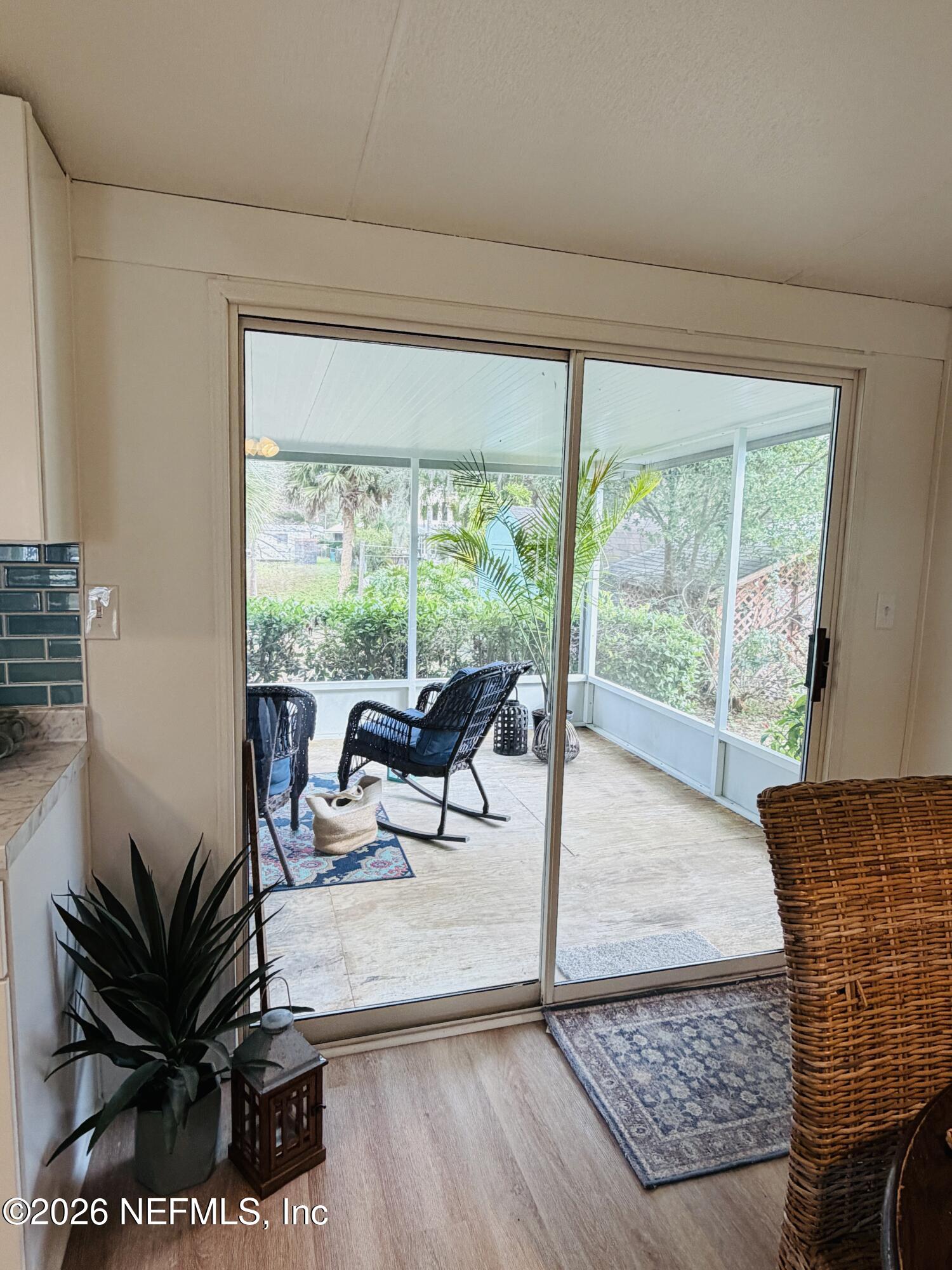 116 Waterside Avenue Satsuma, FL 32189 - Photo 13 of 53 a living room with furniture and a large window